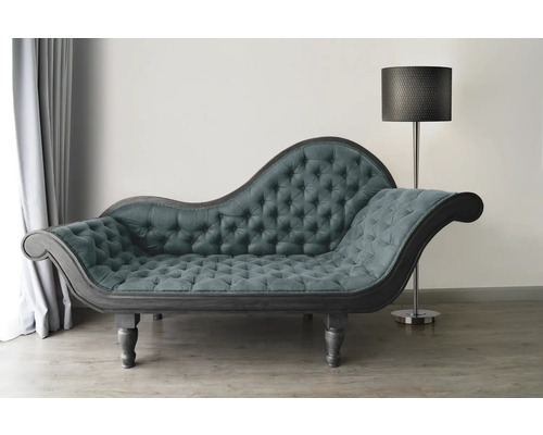 Chaise longue met knoopsluiting en staande lamp