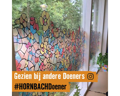 Raam met glasfolie met bloemmotief