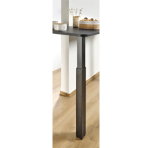 Detailopname van een in hoogte verstelbare tafel met donker metalen onderstel