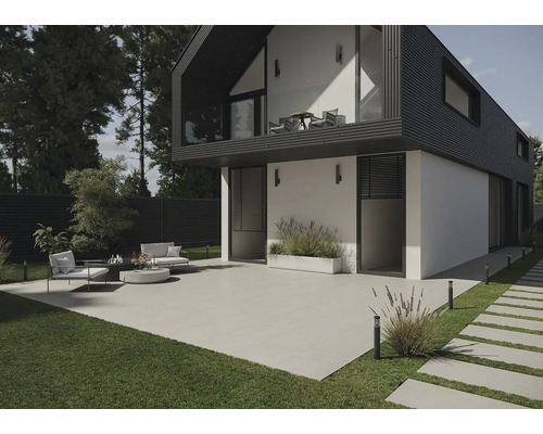 Modern huis met terras, tuinmeubilair en gazons