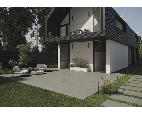 Moderne gevel met terras, tuinmeubelen en gazon