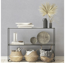 Decoratief rek met manden, boeken, schalen en vazen