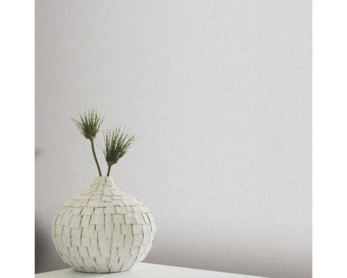 Textielbehang met linnenstructuur en vaas met decoratie