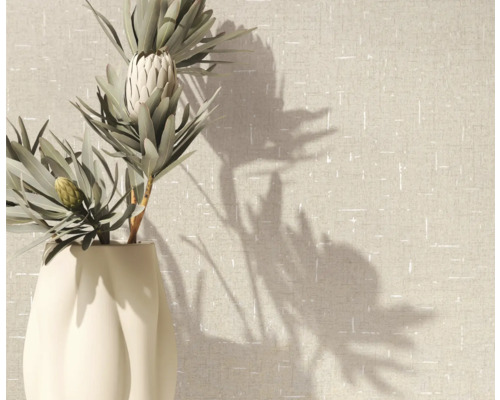 Decoratieve plant in een vaas voor een gestructureerde muur