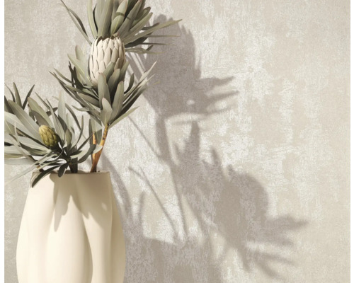 Decoratieve vaas met planten op een gestructureerde achtergrond
