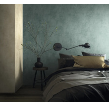 Slaapkamer met bed, lamp en decoratie