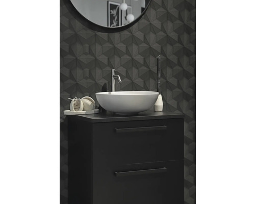 Moderne badkamer met wastafel, onderkast en geometrische tegels