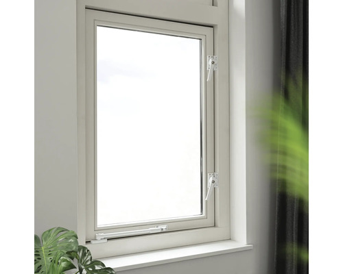 Binnenaanzicht van een wit draai-kiepraam met handgreep