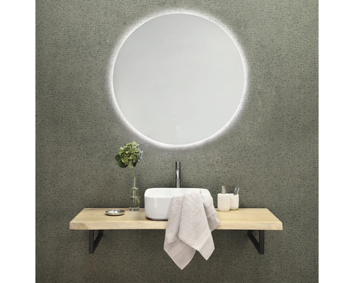 Badkamerontwerp met ronde spiegel, wastafel, kraan en plank