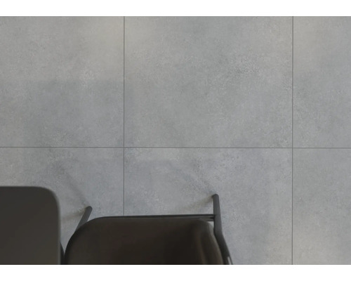 Grijze tegels met stoel en tafel van bovenaf