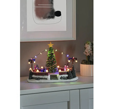 Verlichte winterdorp decoratie met kerstboom en figuren