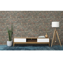 Woonkamer met modern tv-meubel voor een bakstenen muur