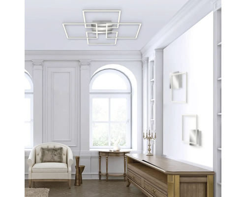 Woonkamer met moderne plafondlamp met geometrische vormen