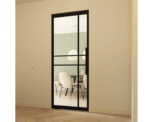 Schuifdeur met glas en zwart frame in een lichte kamer