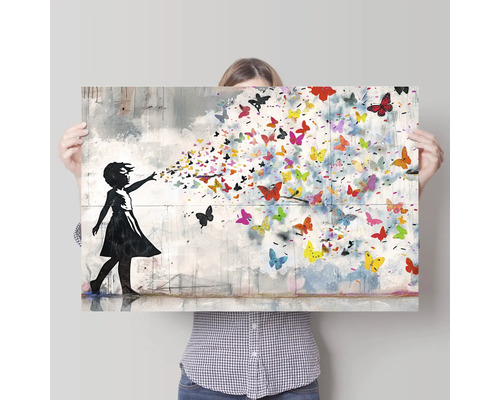 Decoratief canvas met meisjessilhouet en kleurrijke vlinders