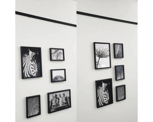 Wanddecoratie met fotolijsten aan een railsysteem