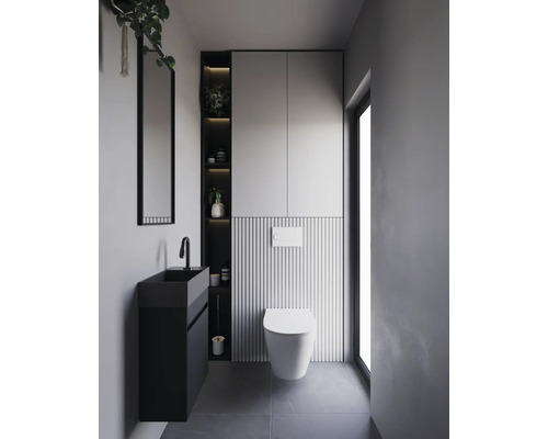 Moderne badkamer met wastafel, toilet en spiegelkast