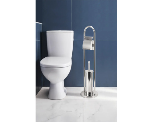 Badkamer met toilet en toiletpapierhouder met borstelgarnituur