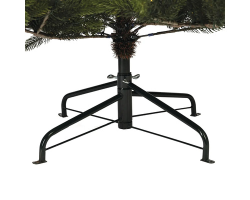 Detailopname van de zwarte metalen voet van een kerstboom voor stabilisatie.