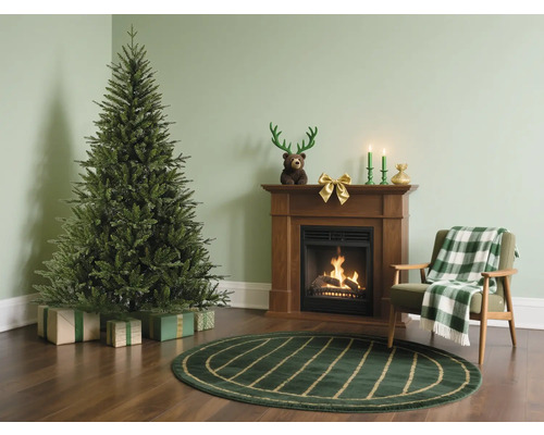Kerstscène met kerstboom, cadeaus, open haard en fauteuil