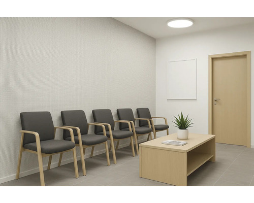 Wachtkamer met stoelen, tafel en plant