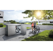 Metalen fietsbox met fietsen en een stel buiten