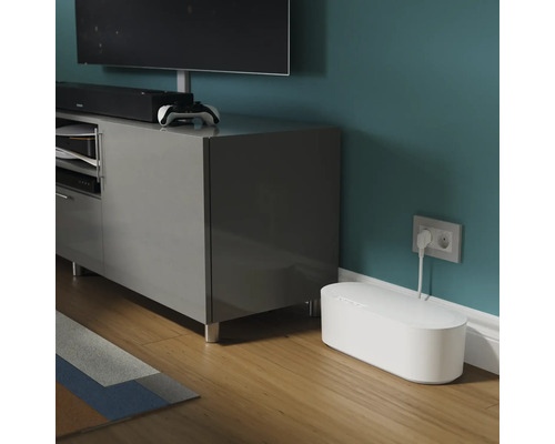 Woonkamer met tv-meubel en kabelbox voor kabelopslag