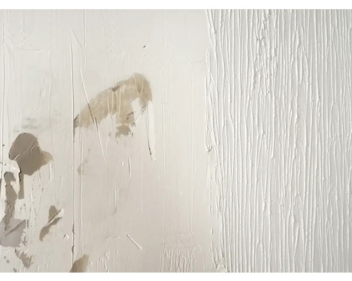 Muur met oud en nieuw decoratief stucwerk