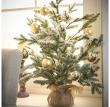 Gedecoreerde miniatuur kerstboom met ballen