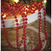 Decoratie met rode ballen aan een touwtje
