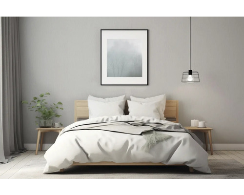 Slaapkamer met bed, nachtkastjes, lamp en decoratie voor een gezellige sfeer