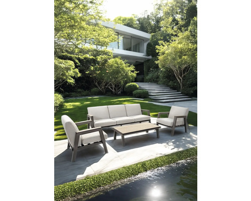 Tuinmeubelset met bank, stoel en tafel voor een modern huis