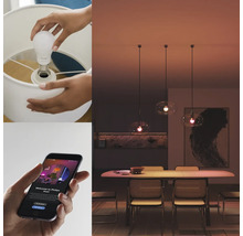 Persoon schroeft een slimme lamp in een lamp en bedient deze met een app.
