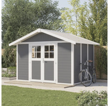 Tuinhuis met dubbele deur en fiets in de tuin