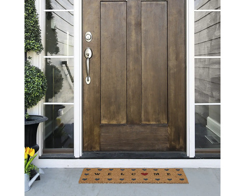Deurmat met welkomstgroet voor een voordeur