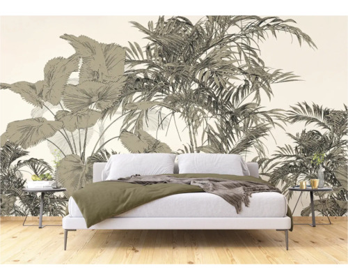 Slaapkamer met fotobehang met tropische plantenmotieven achter een bed