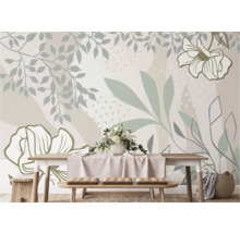 Woonkamer met fotobehang met plantmotieven, eettafel en zitbank