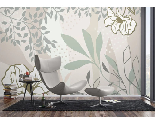 Woonkamer met moderne fauteuil en behang met plantmotieven