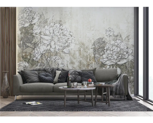 Woonkamer met bank, salontafel en bloemenwandbekleding voor een stijlvolle inrichting.