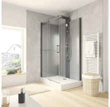 Badkamer met douchecabine, handdoekradiator en decoratie