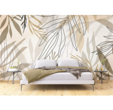 Slaapkamer met botanisch behang met bladeren