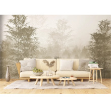 Lichte woonkamer met bank, salontafels en bamboebosbehang voor een rustige sfeer.