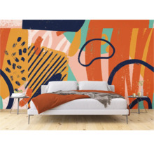 Slaapkamer met abstract behang en bed