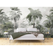 Slaapkamer met junglebos fotobehang en wit bed