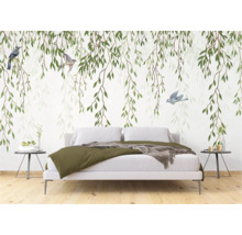 Slaapkamer met fotobehang met bladeren en vogels