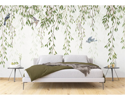 Slaapkamer met fotobehang met bladeren en vogels