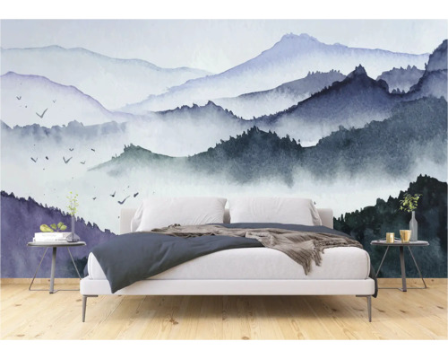 Slaapkamer met een fotobehang met bergmotief