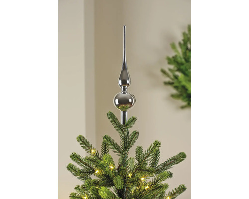 Metalen kerstboom piek op een kerstboom