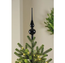 Zwarte kerstboompiek op een kerstboom