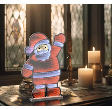 Decoratieve Santa Claus LED-figuur op een tafel